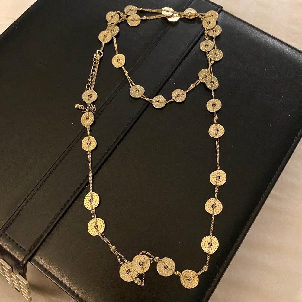 Long gold necklace
